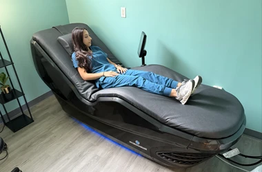 A hyrdo massage AquaBed being used by a patient