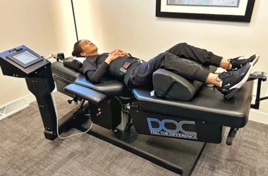 A patient using a spinal decompression table
