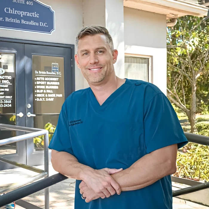 Dr. Brittin Beaulieu standing outside the clinic at S & B Chiropractic and Rehab, Inc.